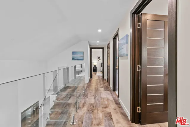 a view of swimming pool with outdoor seating and plants