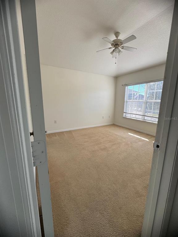 6404 South Goldenrod Road, Unit 2A Orlando, FL 32822 - Photo 21 of 21 a view of an empty room