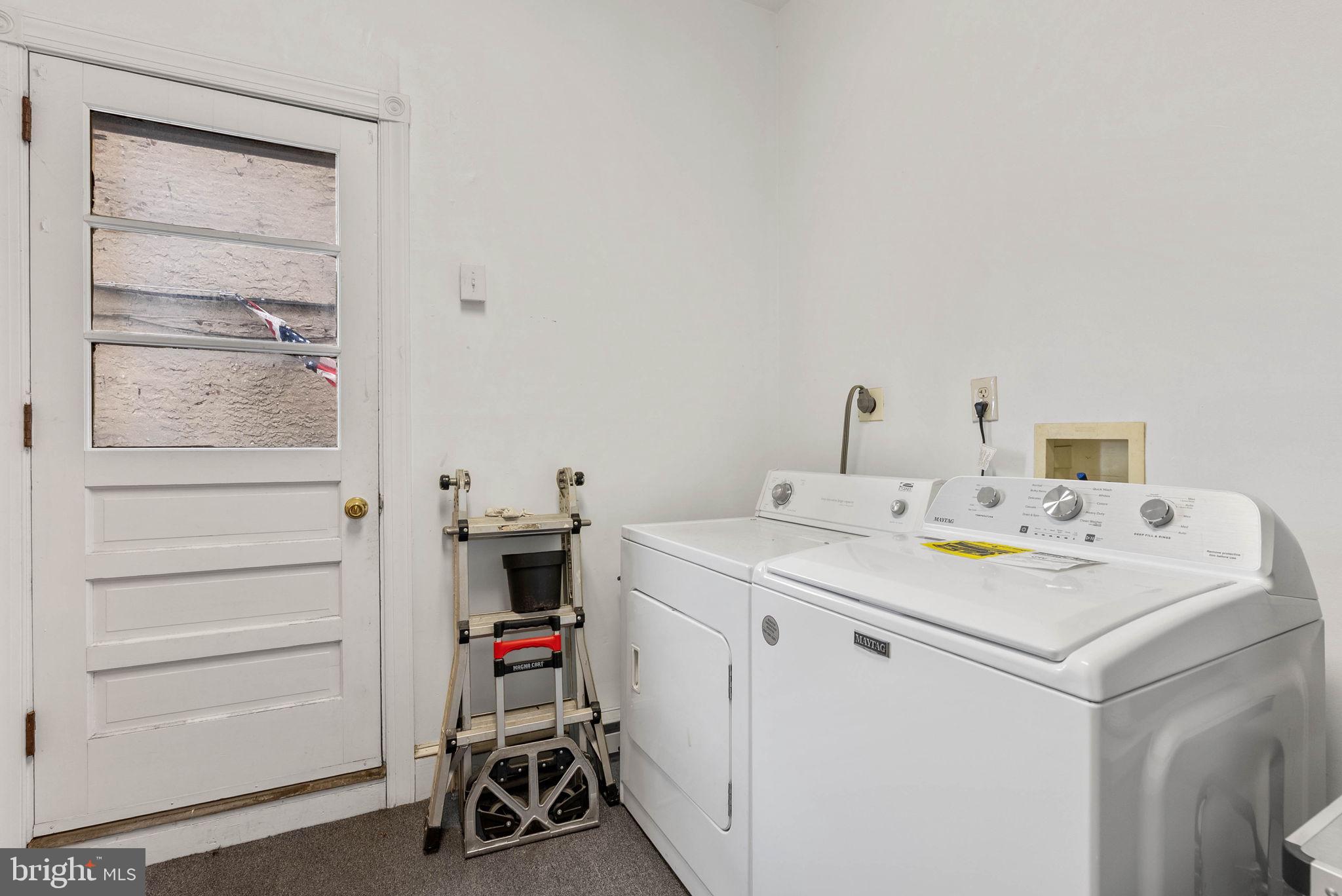 732 Tasker Street, Unit 3 Philadelphia, PA 19148 - Photo 9 of 9 a utility room with dryer and washer