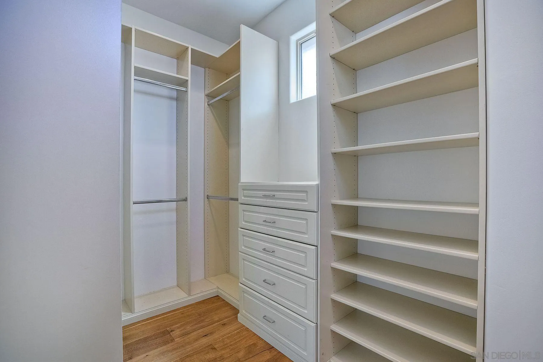2009 MacKinnon Avenue Encinitas, CA 92007 - Photo 12 of 46 a view of walk in closet with empty racks