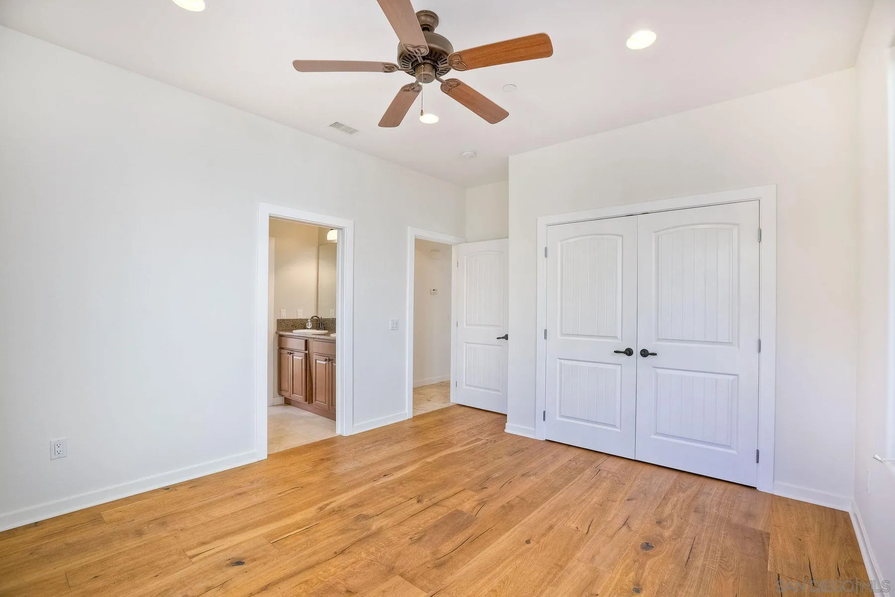 2009 MacKinnon Avenue Encinitas, CA 92007 - Photo 21 of 46 a view of empty room with wooden floor