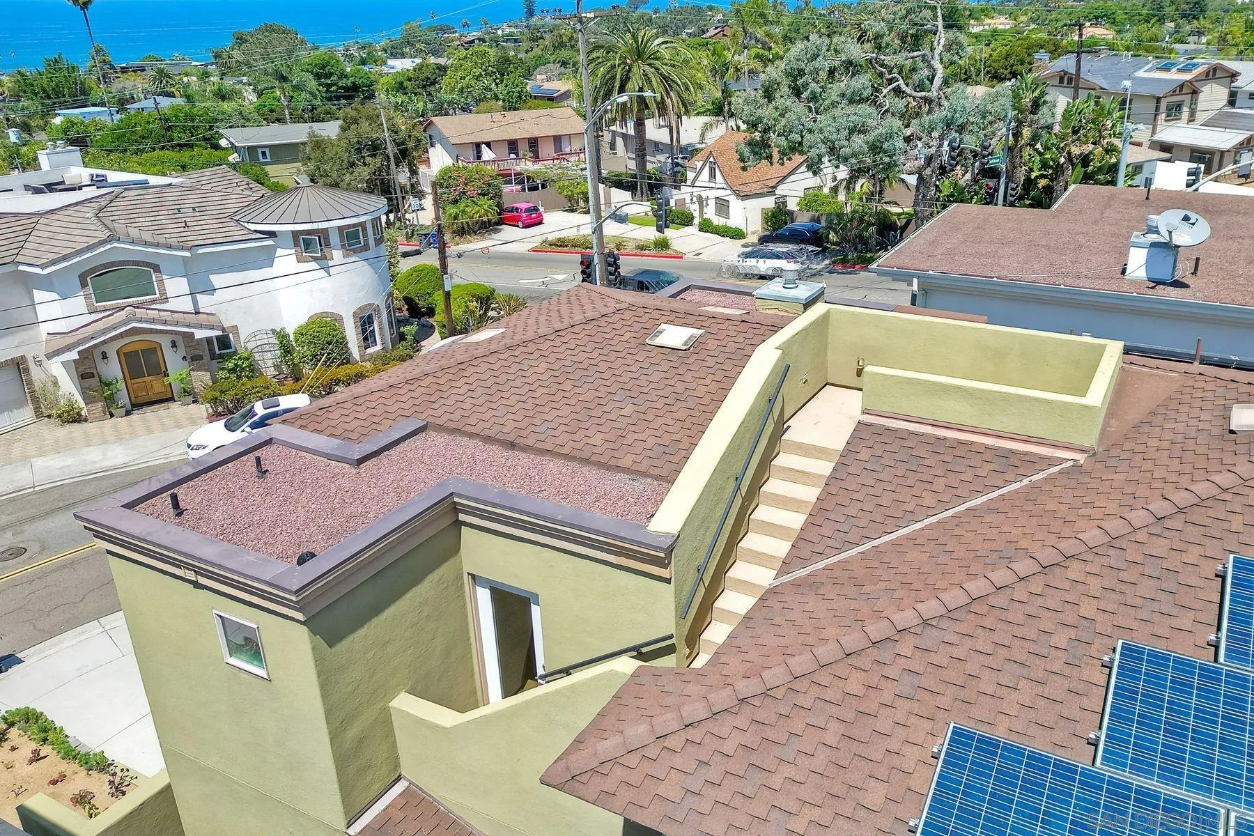 2009 MacKinnon Avenue Encinitas, CA 92007 - Photo 29 of 46 a view of a swimming pool with a lounge chairs