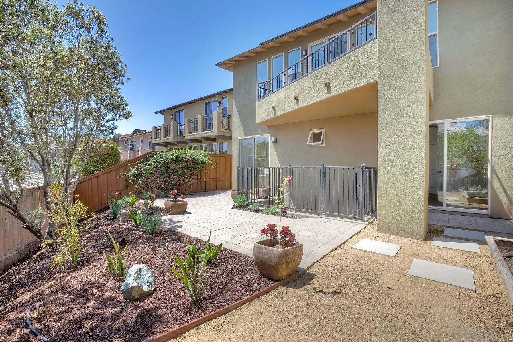2009 MacKinnon Avenue Encinitas, CA 92007 - Photo 37 of 46 a front view of a house with garden