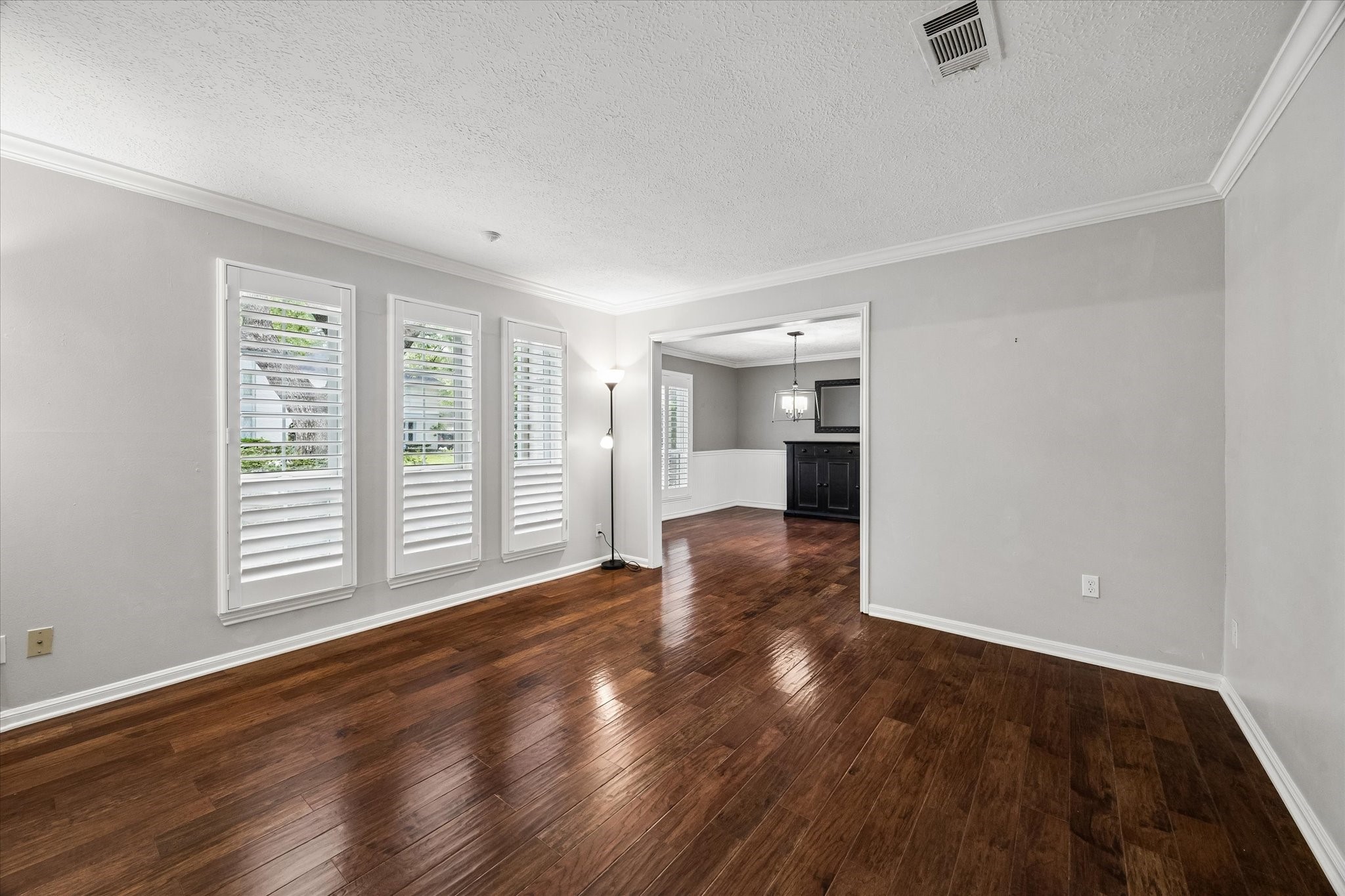 9410 Taidswood Drive Spring, TX 77379 - Photo 13 of 40 The formal living room would make a fantastic sitting area, library, game room, play room, music room (can you imagine a baby grand piano here?), or truly any additional space you need.