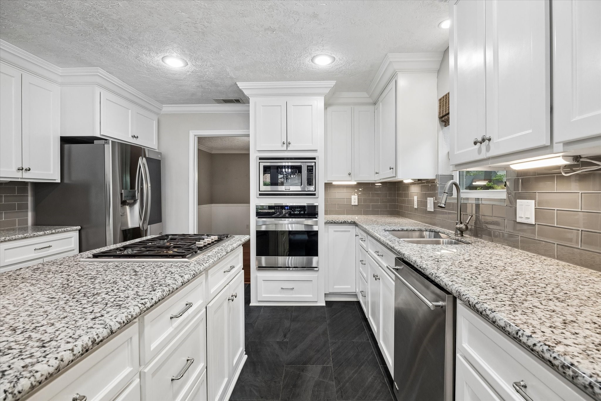 9410 Taidswood Drive Spring, TX 77379 - Photo 21 of 40 Another angle of this beautifully redone kitchen! All appliances convey with the home.