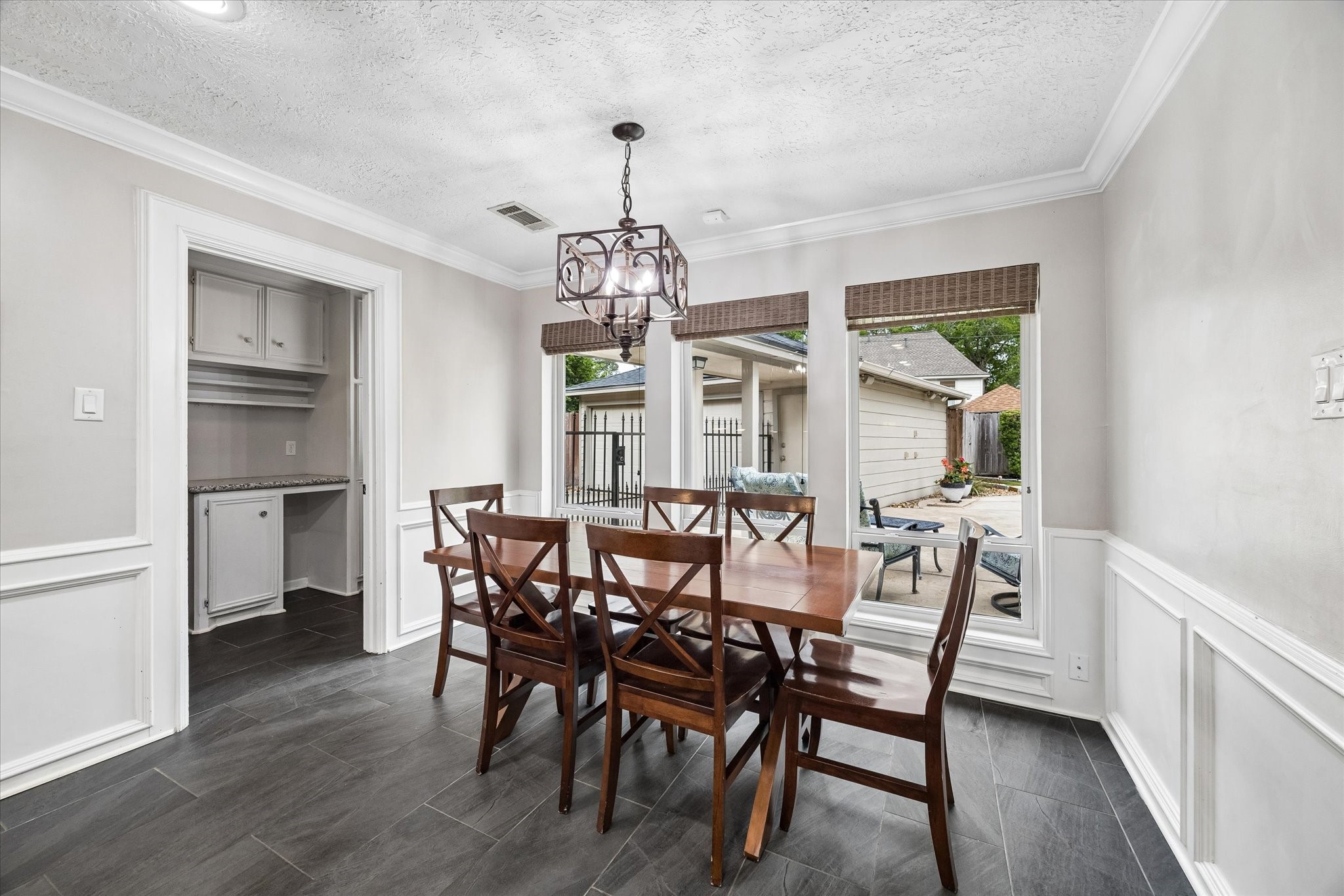 9410 Taidswood Drive Spring, TX 77379 - Photo 23 of 40 A close-up of the very large breakfast area/eat-in kitchen with the mud room/laundry room to the left.