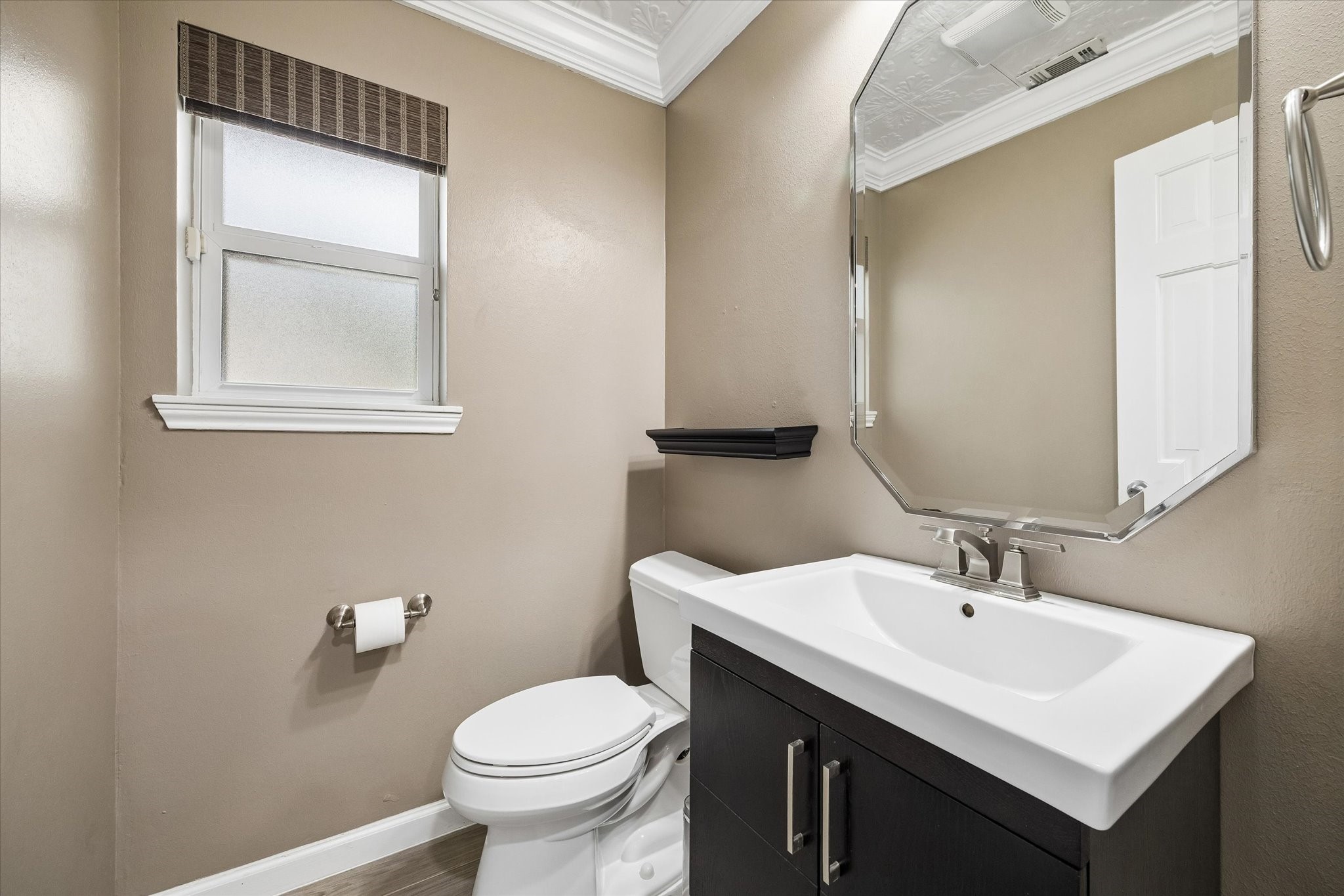 9410 Taidswood Drive Spring, TX 77379 - Photo 24 of 40 The powder bathroom/half-bathroom is situated on the first floor and offers new flooring and a new toilet. This additional bathroom is a must have for guests!