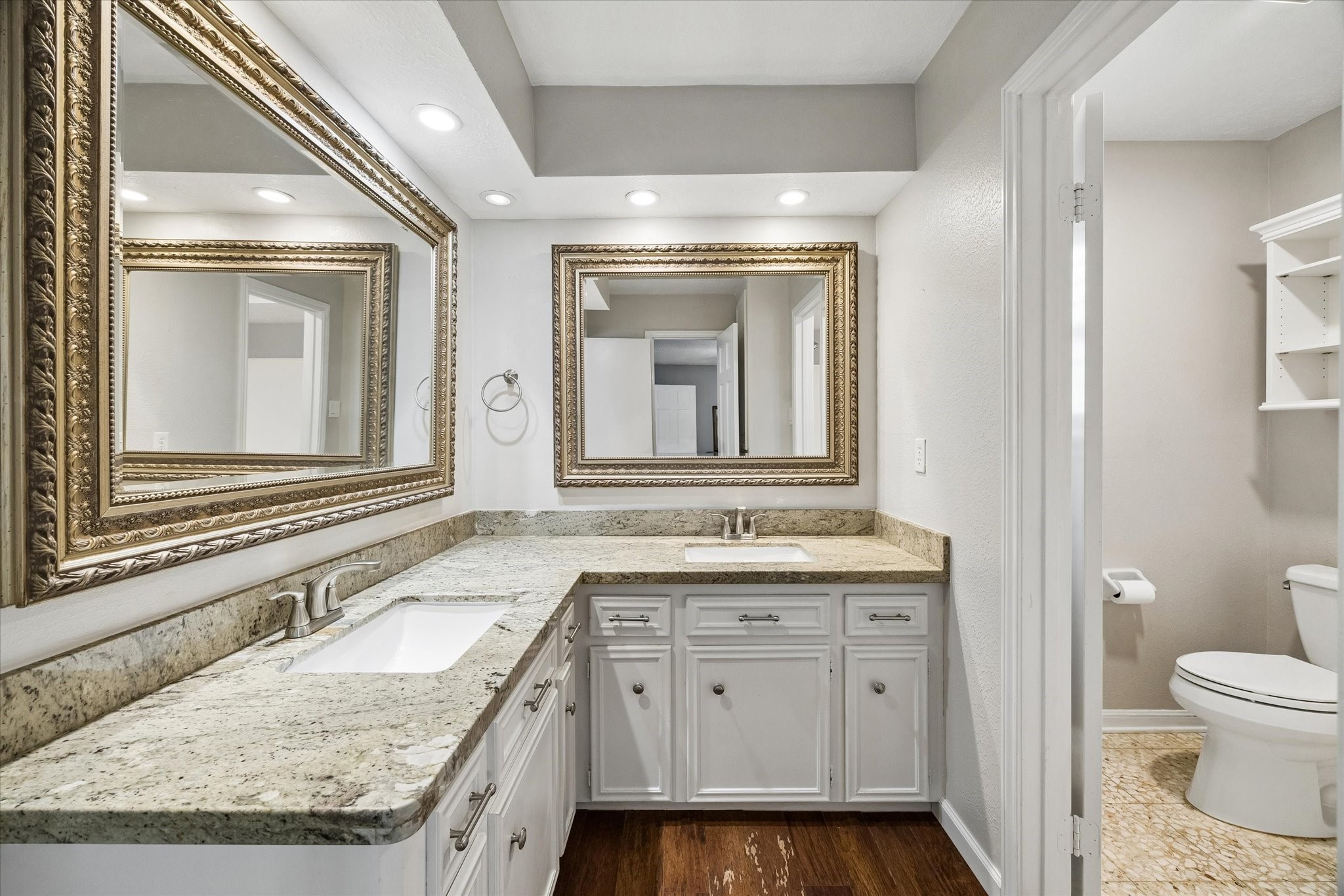 9410 Taidswood Drive Spring, TX 77379 - Photo 32 of 40 The shared bathroom situated between two of the upstairs secondary bedrooms offers two sinks, and tons of bathroom storage! A separate toilet and shower area makes sharing this bathroom a breeze!