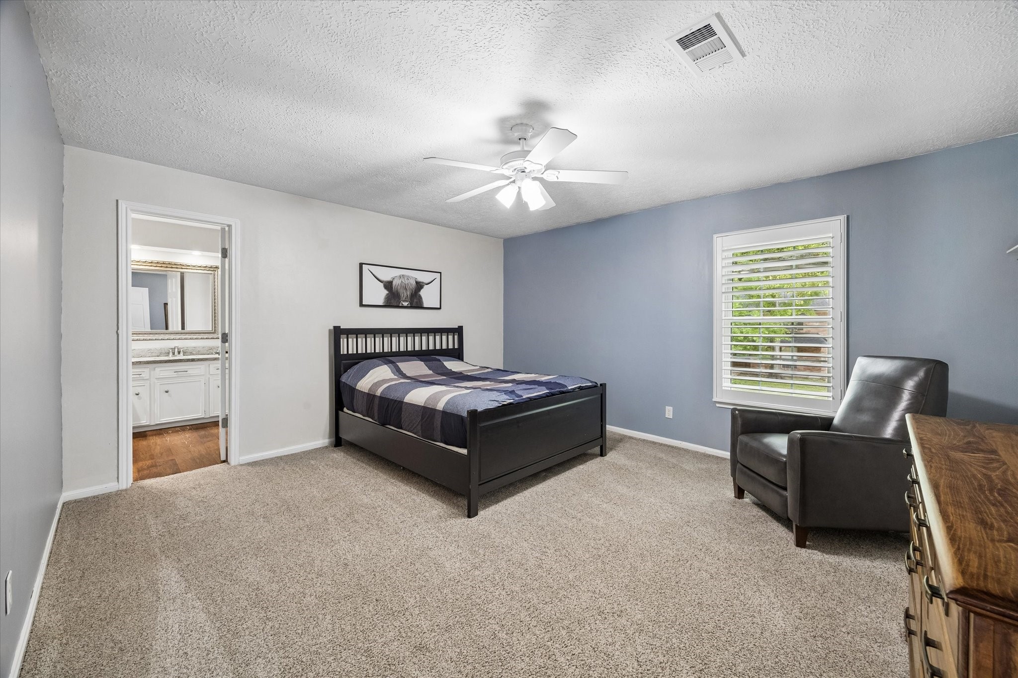 9410 Taidswood Drive Spring, TX 77379 - Photo 33 of 40 The second upstairs secondary bedroom that shares the bathroom ensuite.