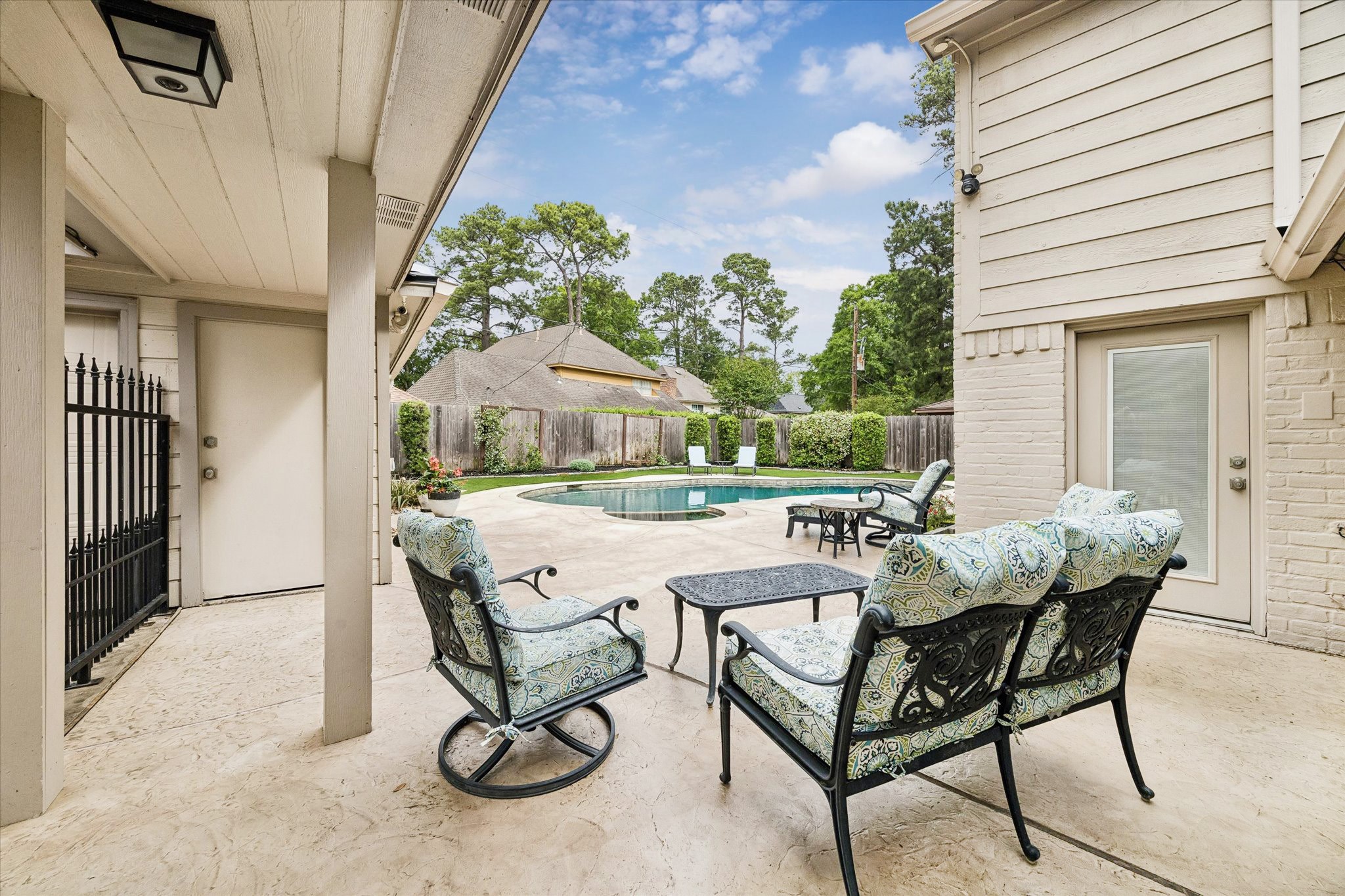 9410 Taidswood Drive Spring, TX 77379 - Photo 4 of 40 Just off the back door and adjacent the driveway is the entrance to your future oasis.