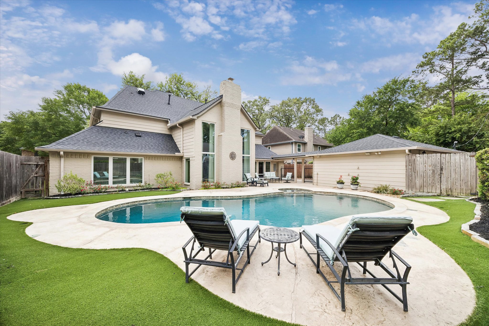 9410 Taidswood Drive Spring, TX 77379 - Photo 7 of 40 Plenty of room for pool loungers and tanning in the yard or relaxing with your favorite drinks or books!