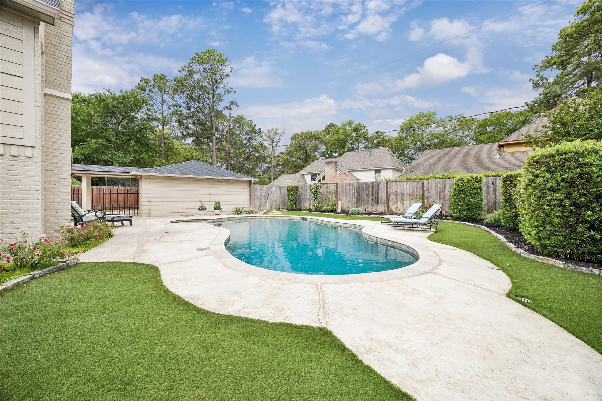 9410 Taidswood Drive Spring, TX 77379 - Photo 8 of 40 This is a nicely designed yard that still allows room for family activities, a game of chase, kicking the soccer ball, or a raised bed garden to grow your own vegetables!