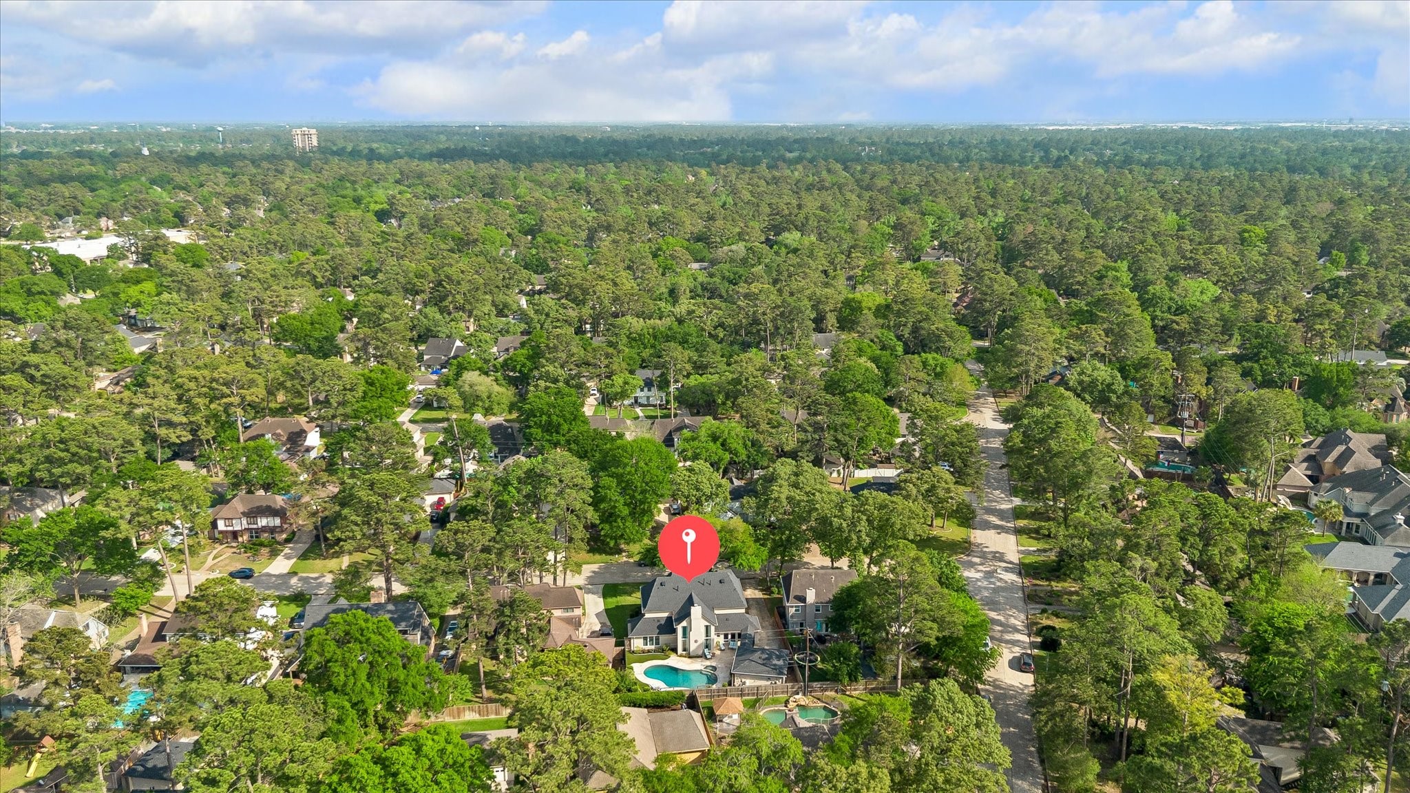 9410 Taidswood Drive Spring, TX 77379 - Photo 10 of 40 As you can see, Champion Forest is a gorgeous community built beneath majestic oaks. The tree line extends for miles and miles! This location is perfectly situated for access to all major necessities, grocery, dining, shopping, and more.