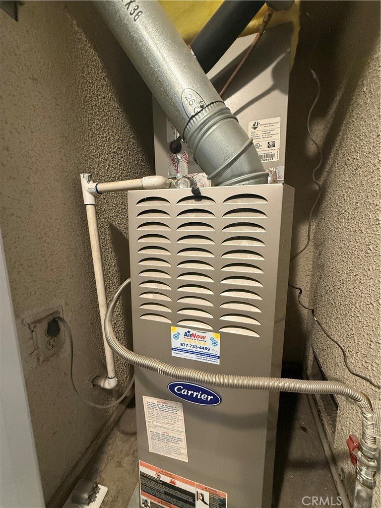 4900 North Grand Avenue, Unit 131 Covina, CA 91724 - Photo 11 of 12 a utility room with a sink