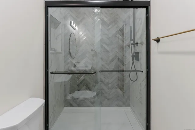 a view of a hallway with closet area