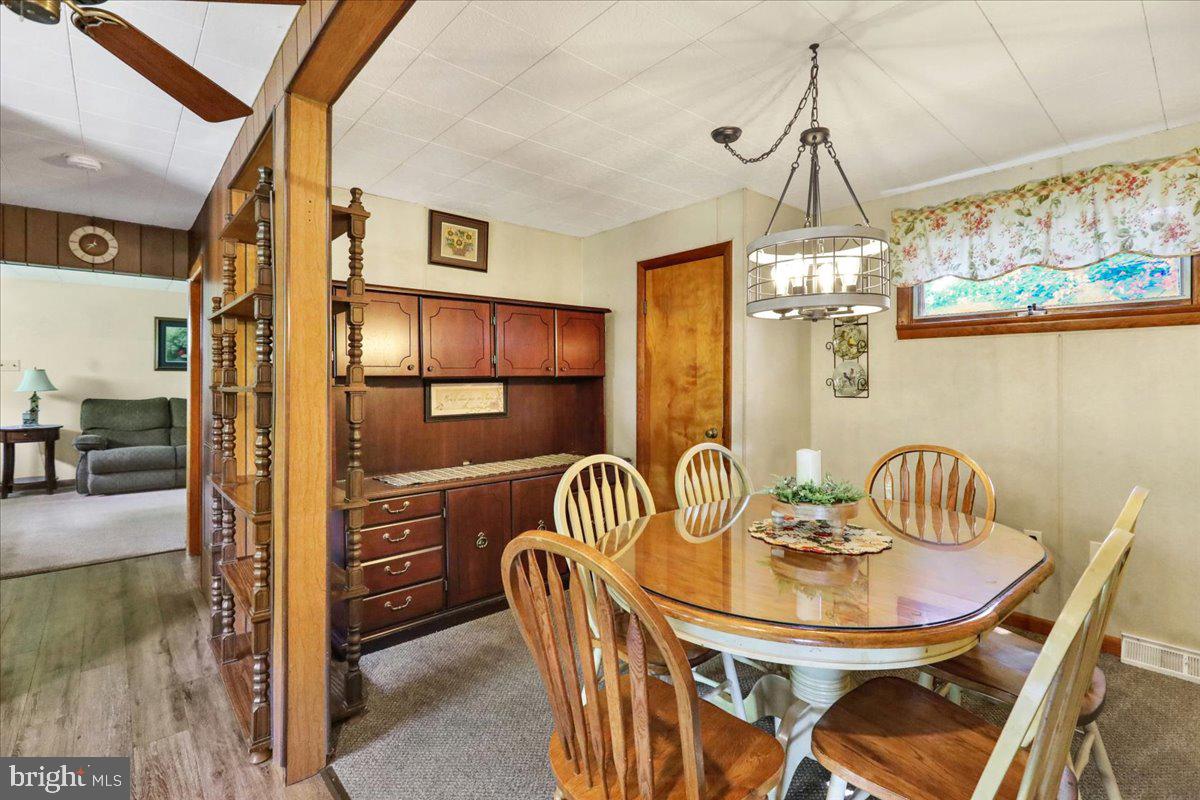 518 Spring Valley Road Reading, PA 19604 - Photo 11 of 49 a dining room with furniture and chandelier kitchen view
