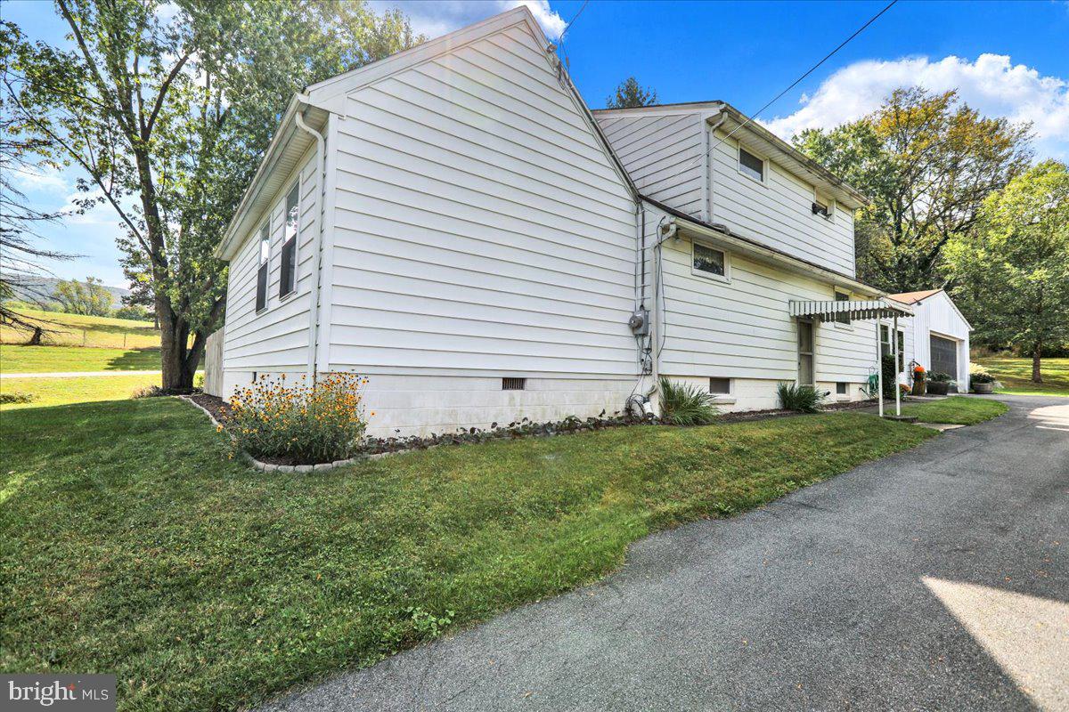 518 Spring Valley Road Reading, PA 19604 - Photo 2 of 49 a view of a house with a backyard