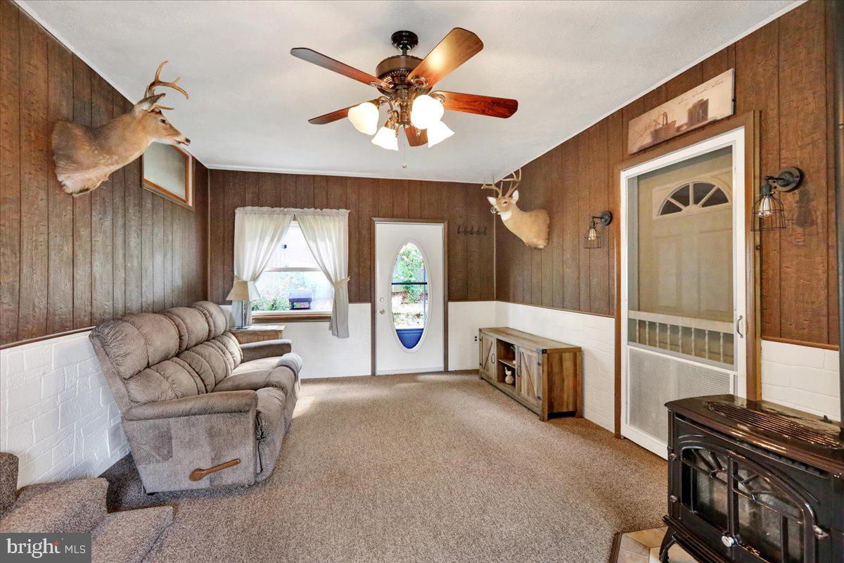 518 Spring Valley Road Reading, PA 19604 - Photo 5 of 49 a living room with furniture and a fireplace