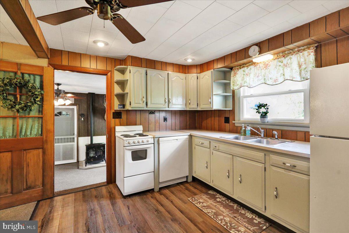 518 Spring Valley Road Reading, PA 19604 - Photo 8 of 49 a kitchen with appliances cabinets and a large window