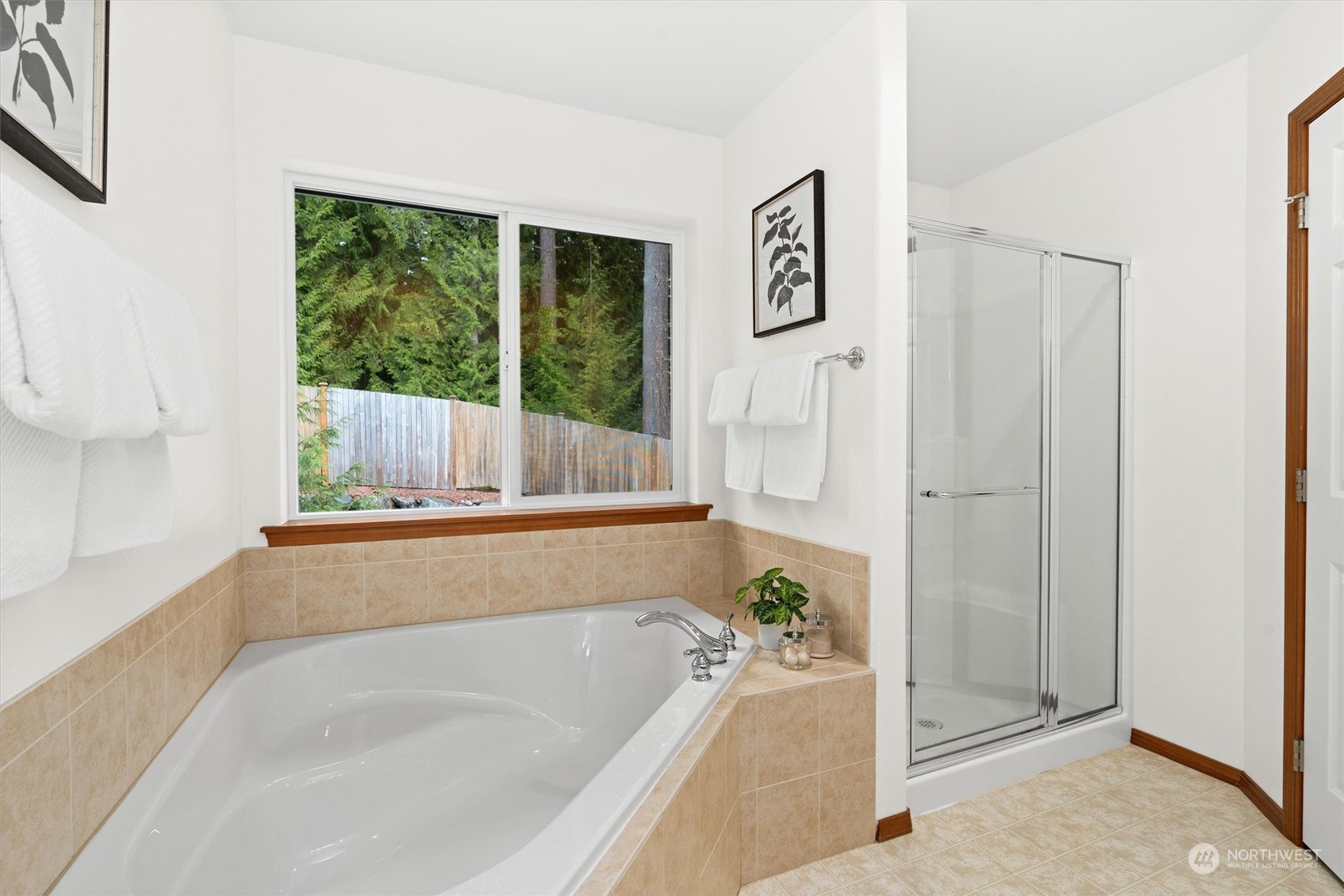 18705 13th Drive Southeast Bothell, WA 98012 - Photo 23 of 40 a bathroom with a bathtub and a shower