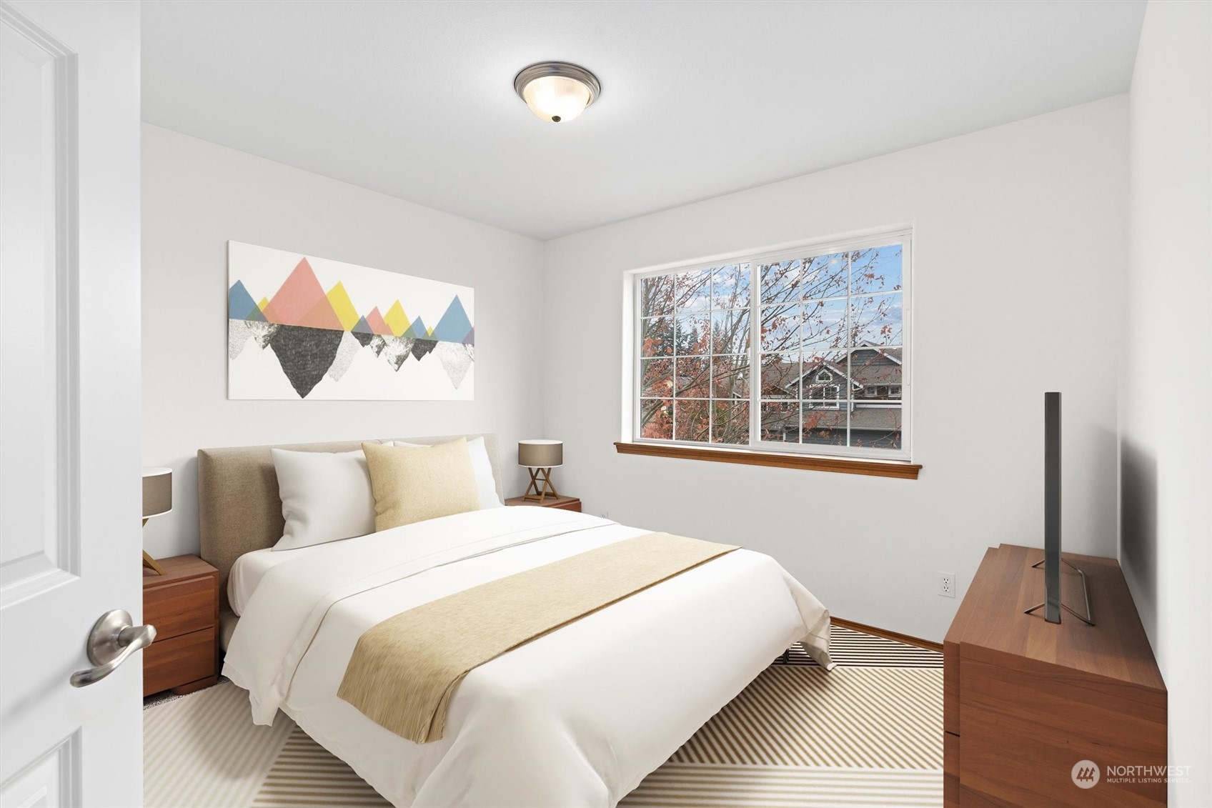 18705 13th Drive Southeast Bothell, WA 98012 - Photo 27 of 40 a bedroom with a bed and a flat screen tv