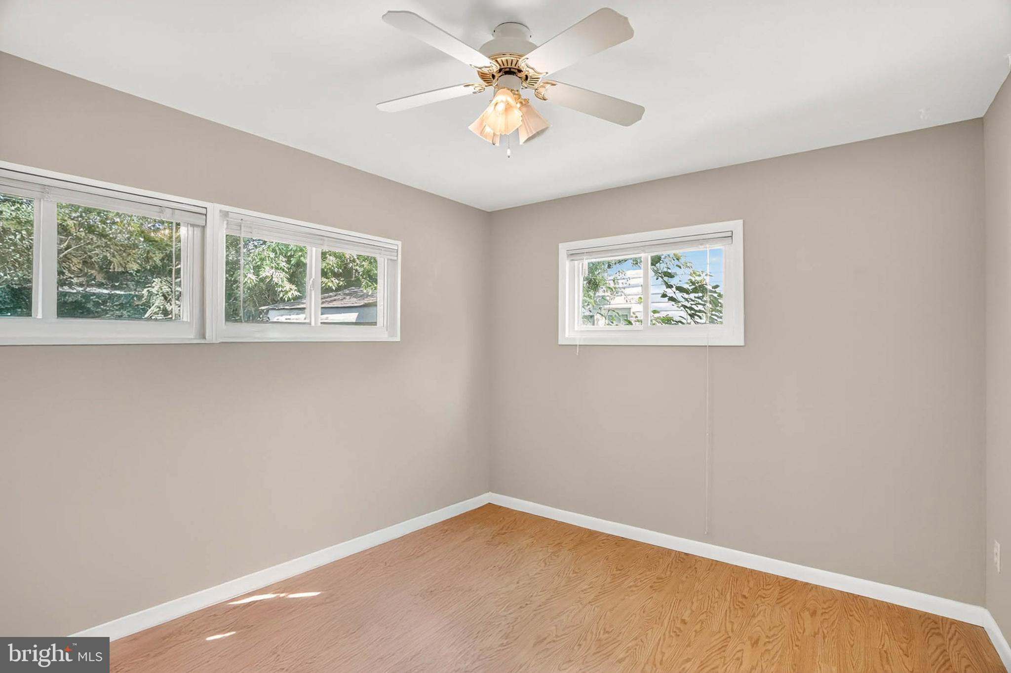 2504 Edgewood Avenue Parkville, MD 21234 - Photo 16 of 25 a view of room with window and ceiling fan