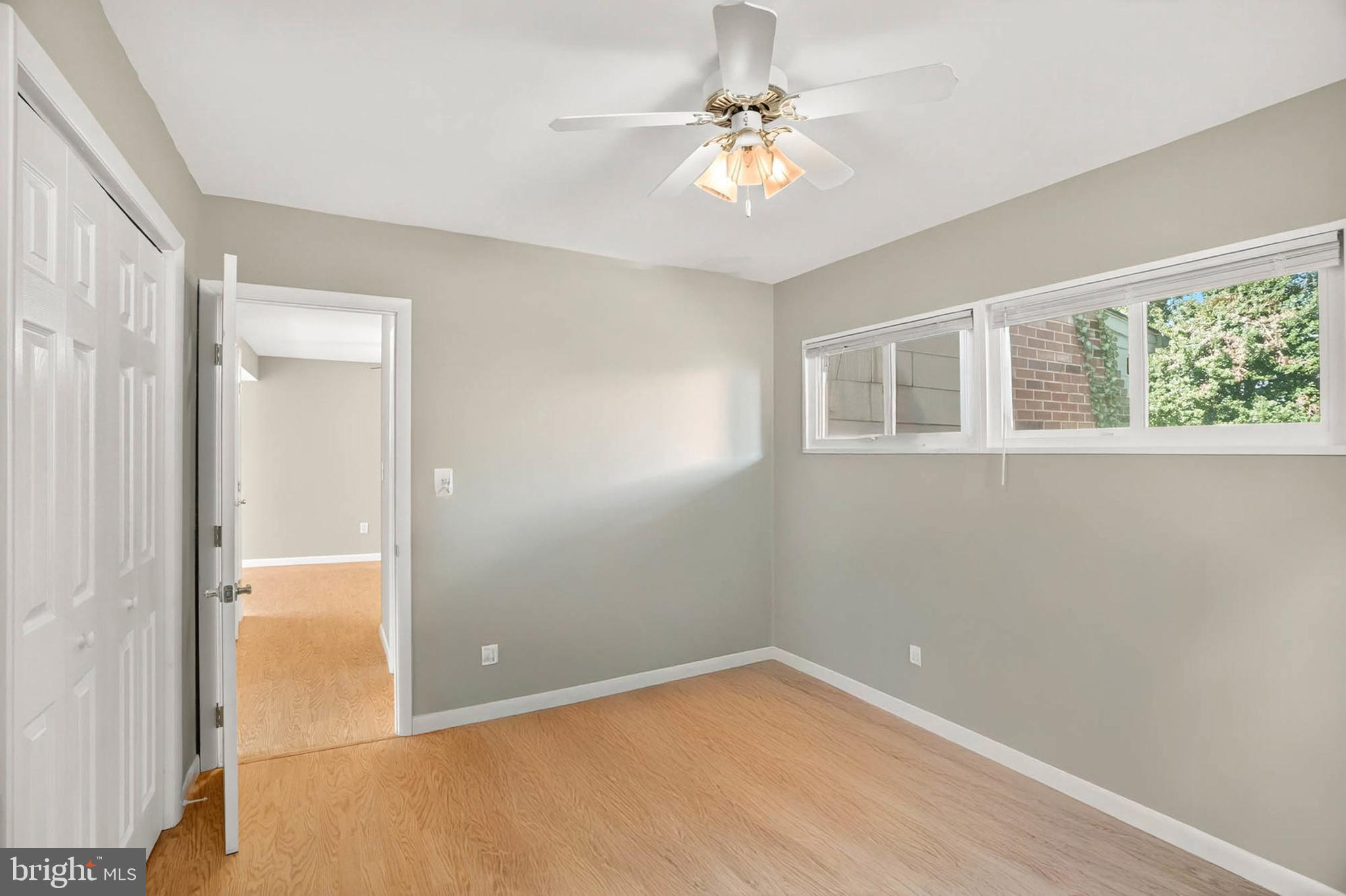 2504 Edgewood Avenue Parkville, MD 21234 - Photo 17 of 25 wooden floor in an empty room with a window