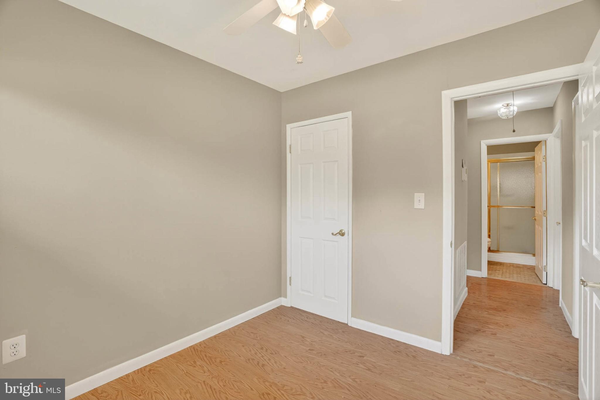 2504 Edgewood Avenue Parkville, MD 21234 - Photo 19 of 25 a view of an empty room and chandelier fan
