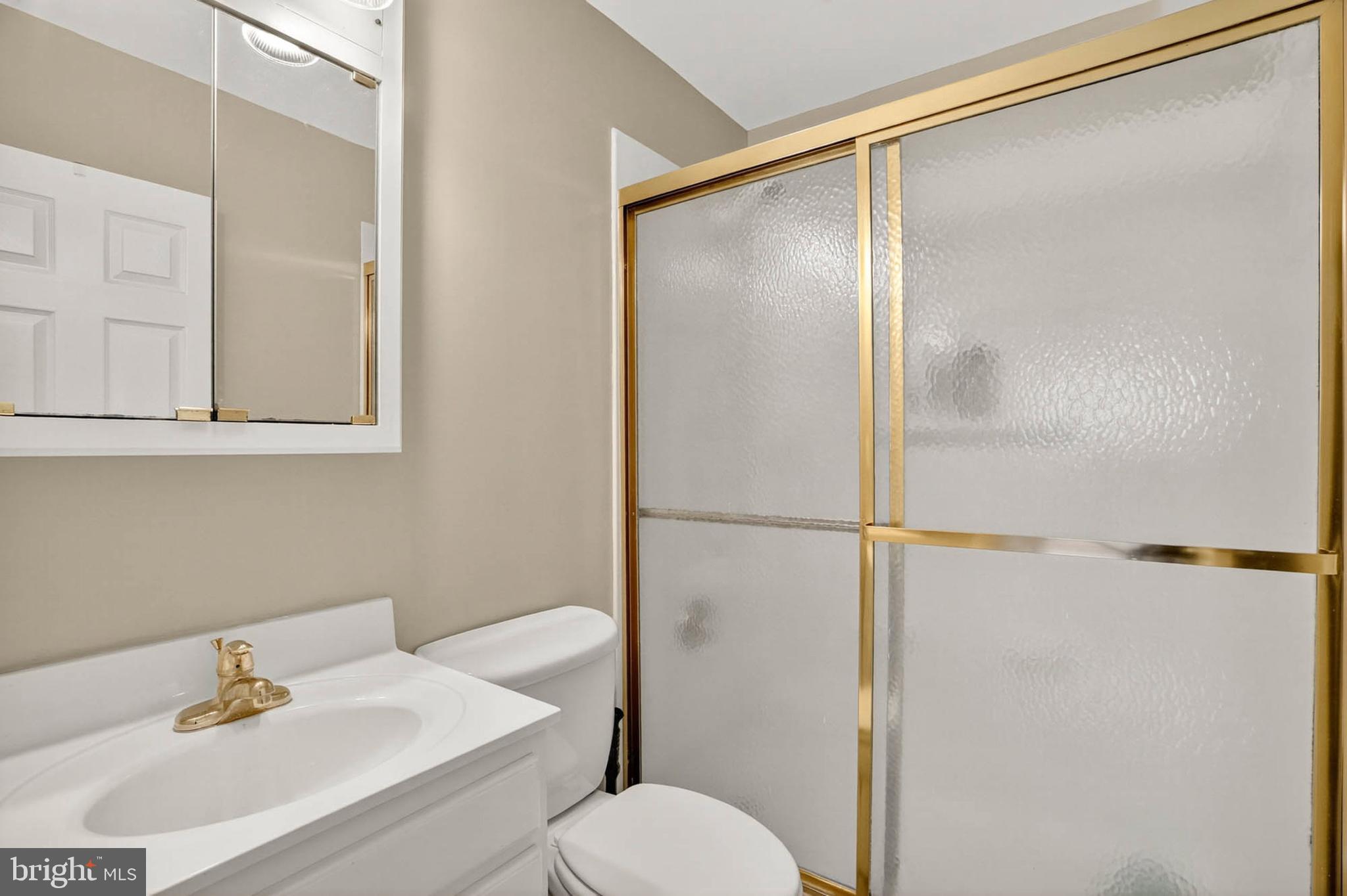 2504 Edgewood Avenue Parkville, MD 21234 - Photo 20 of 25 a bathroom with a sink toilet and shower