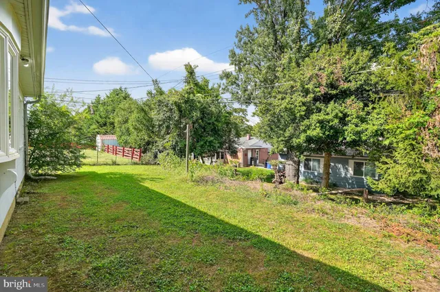 a view of an empty room with stairs