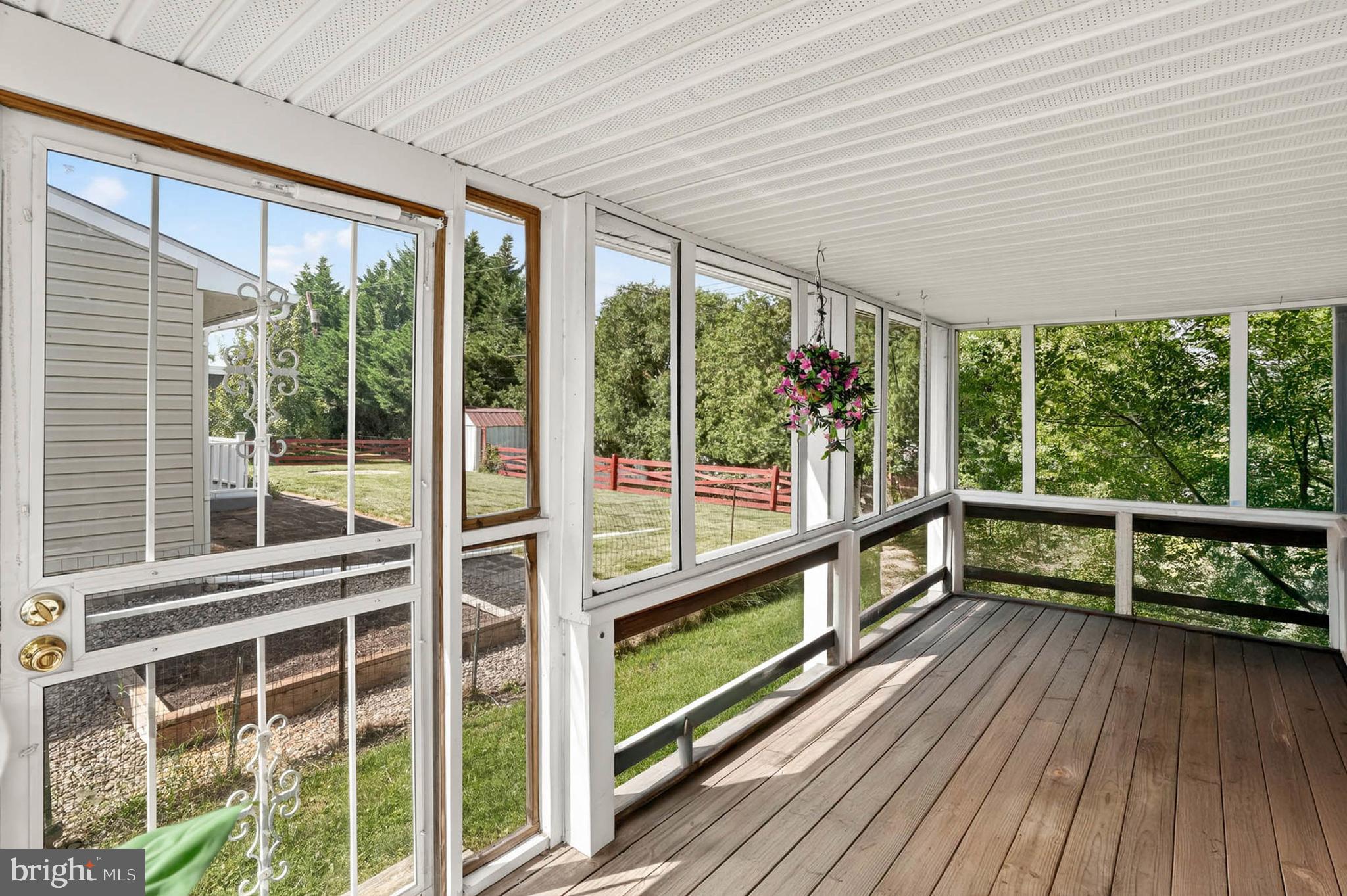 2504 Edgewood Avenue Parkville, MD 21234 - Photo 3 of 25 a view of a balcony with wooden floor