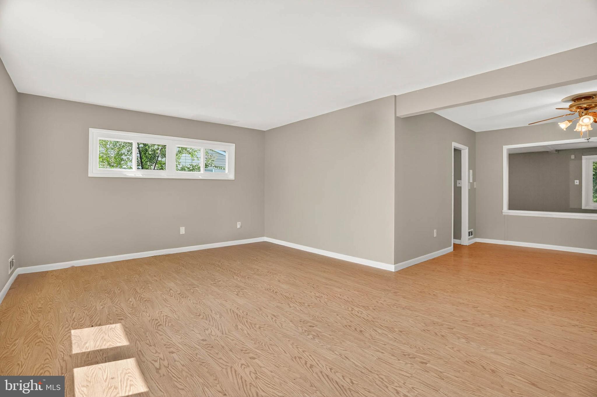2504 Edgewood Avenue Parkville, MD 21234 - Photo 6 of 25 a view of an empty room with window and closet