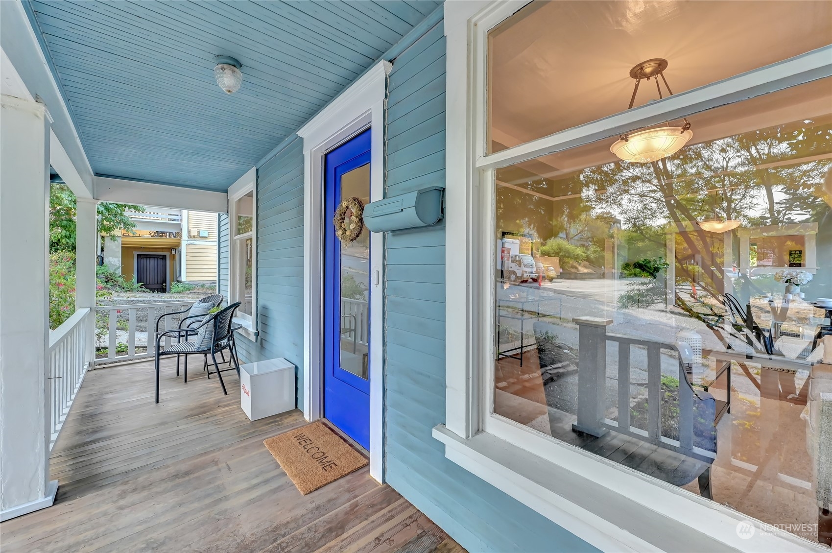 424 North 67th Street Seattle, WA 98103 - Photo 1 of 28 a view of a patio with table and chairs