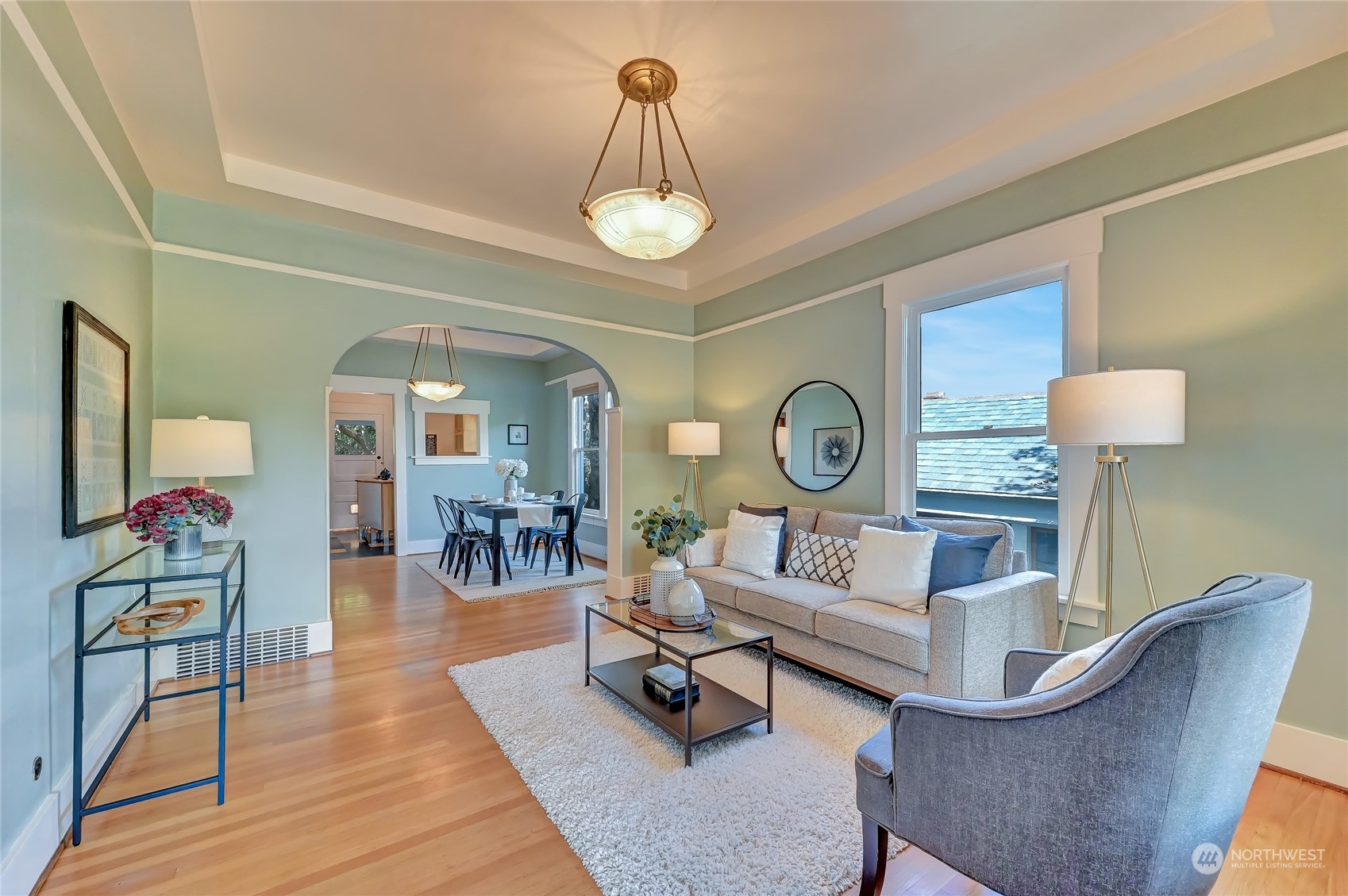 424 North 67th Street Seattle, WA 98103 - Photo 11 of 28 a living room with furniture and a wooden floor