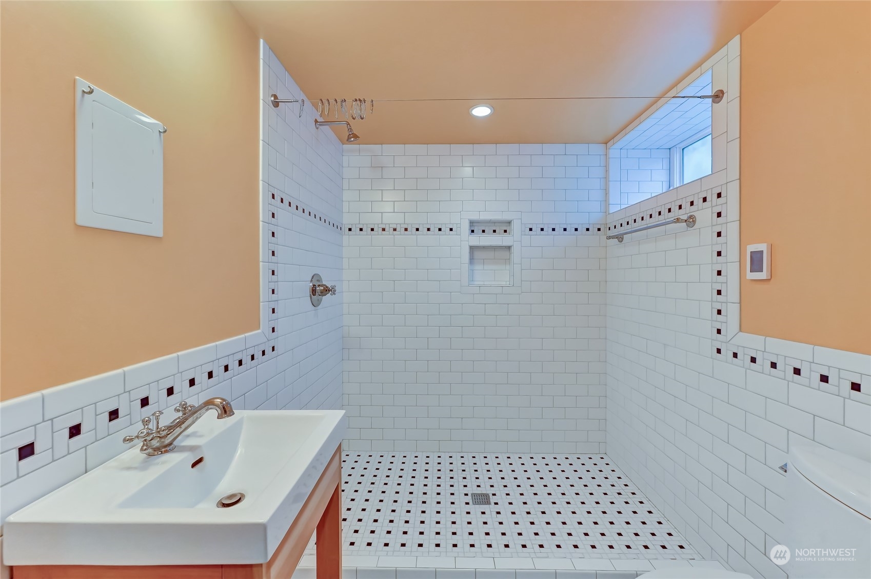 424 North 67th Street Seattle, WA 98103 - Photo 26 of 28 a bathroom with a bathtub and shower