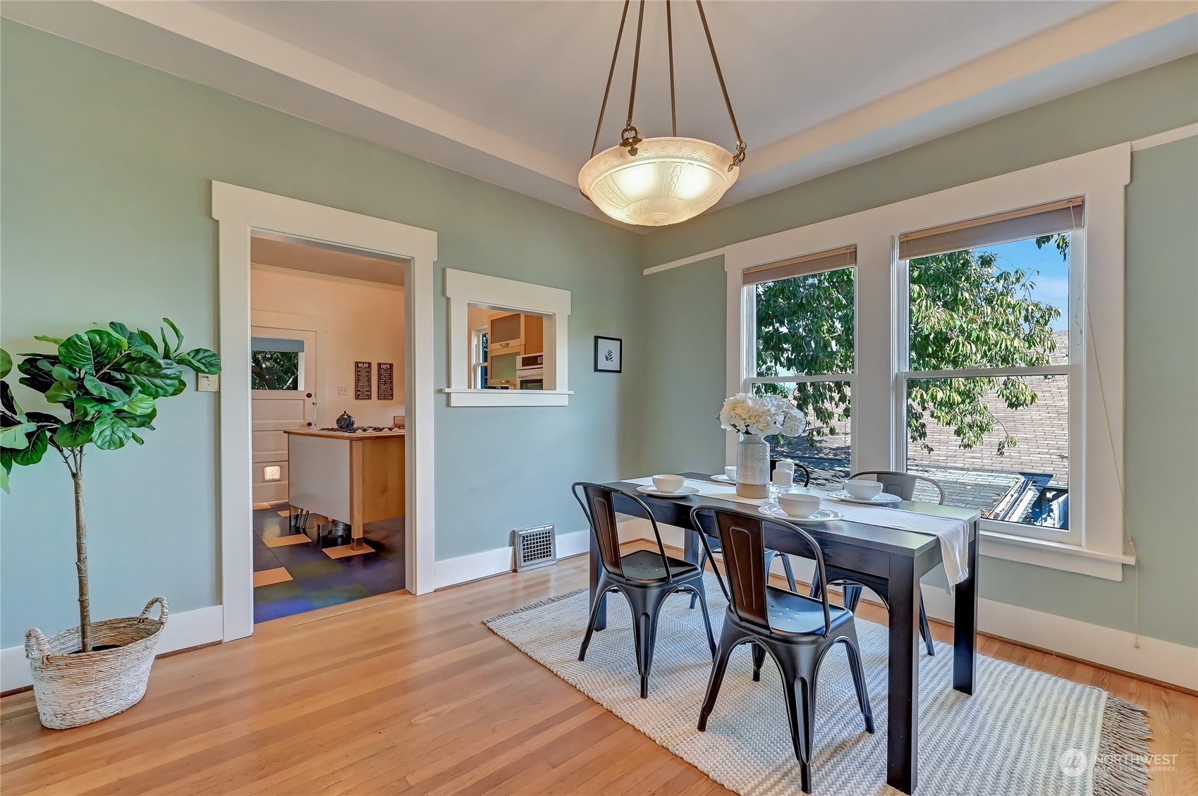 424 North 67th Street Seattle, WA 98103 - Photo 8 of 28 a view of a dining room with furniture window and wooden floor