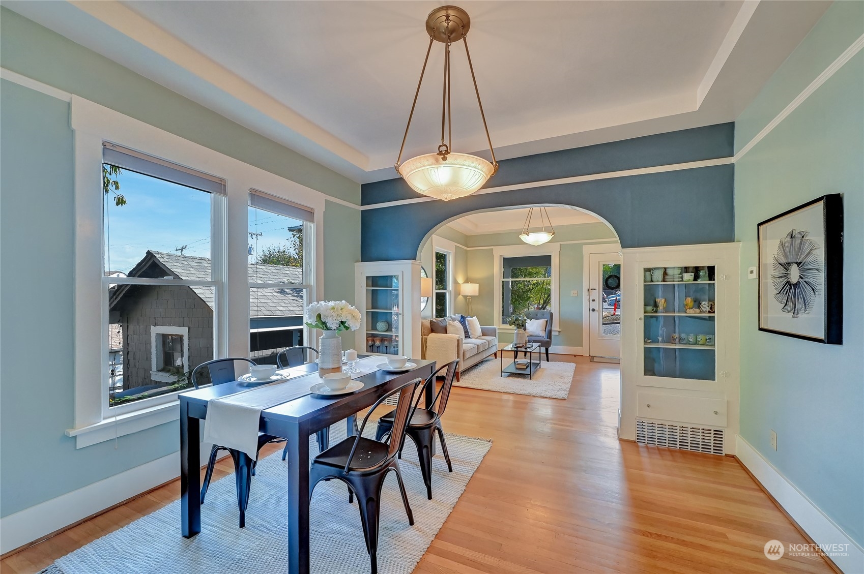 424 North 67th Street Seattle, WA 98103 - Photo 9 of 28 a view of a dining room with furniture window and wooden floor
