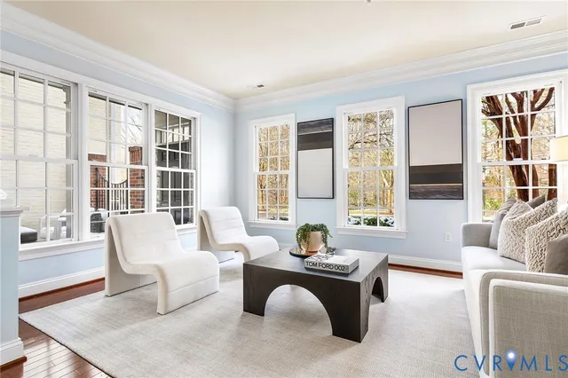 a bathroom with a sink mirror and toilet