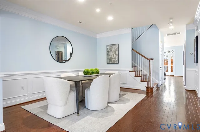 a spacious bedroom with a large bed and a couch