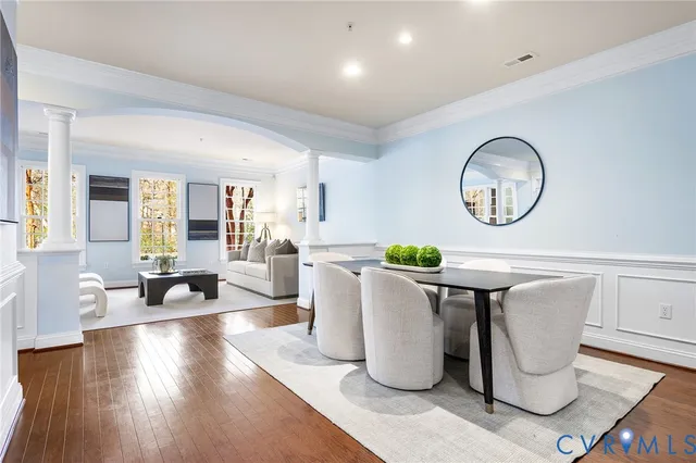 a spacious bedroom with a bed and couch