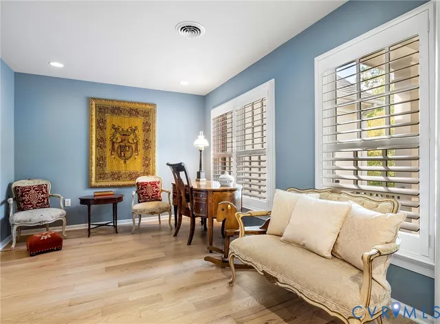 a bathroom with a double vanity sink mirror and shower