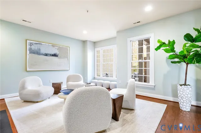 a kitchen with stainless steel appliances granite countertop a sink a stove a microwave and cabinets