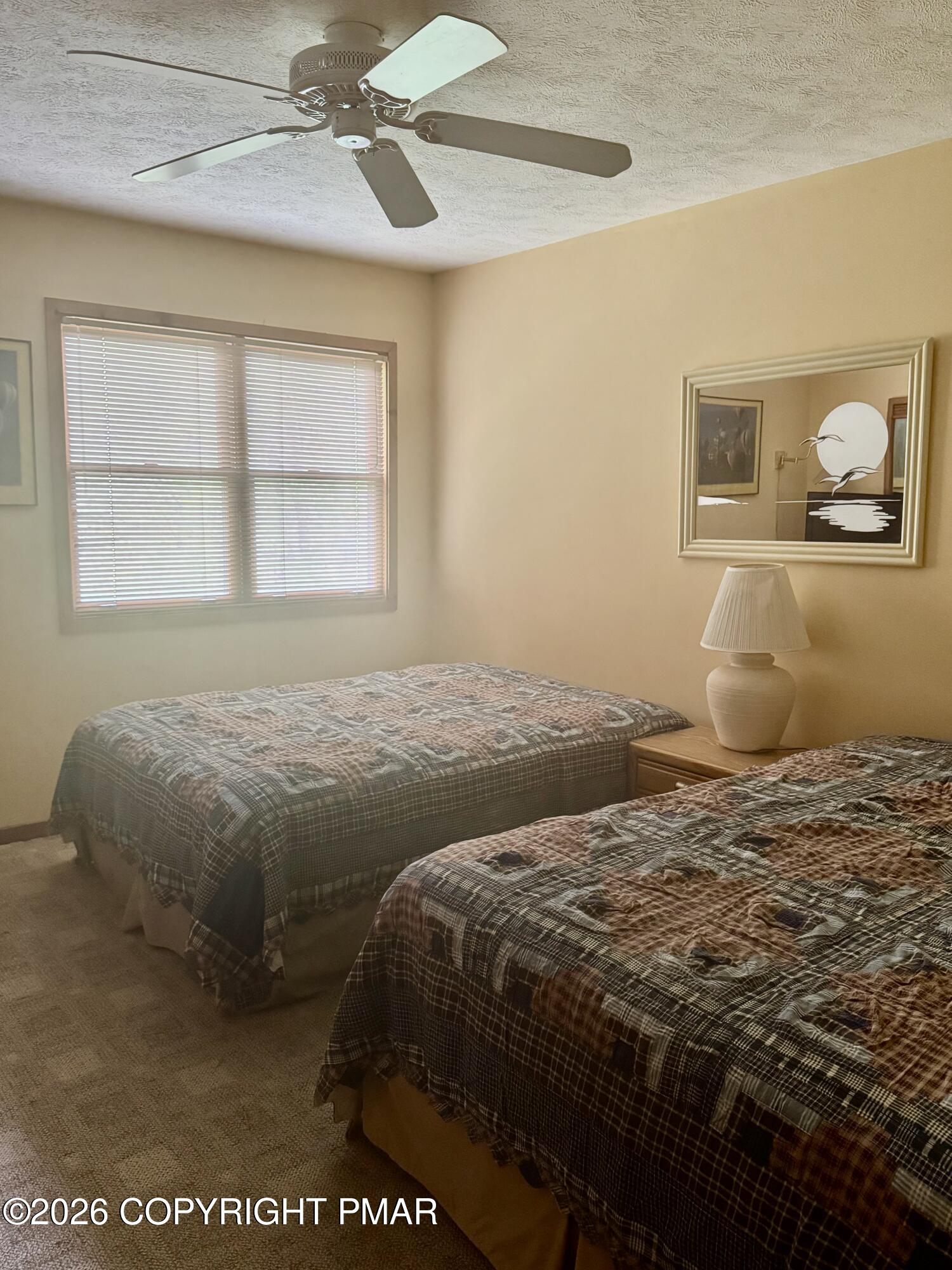 273 Northslope II Road East Stroudsburg, PA 18302 - Photo 12 of 15 a bedroom with a bed and a window