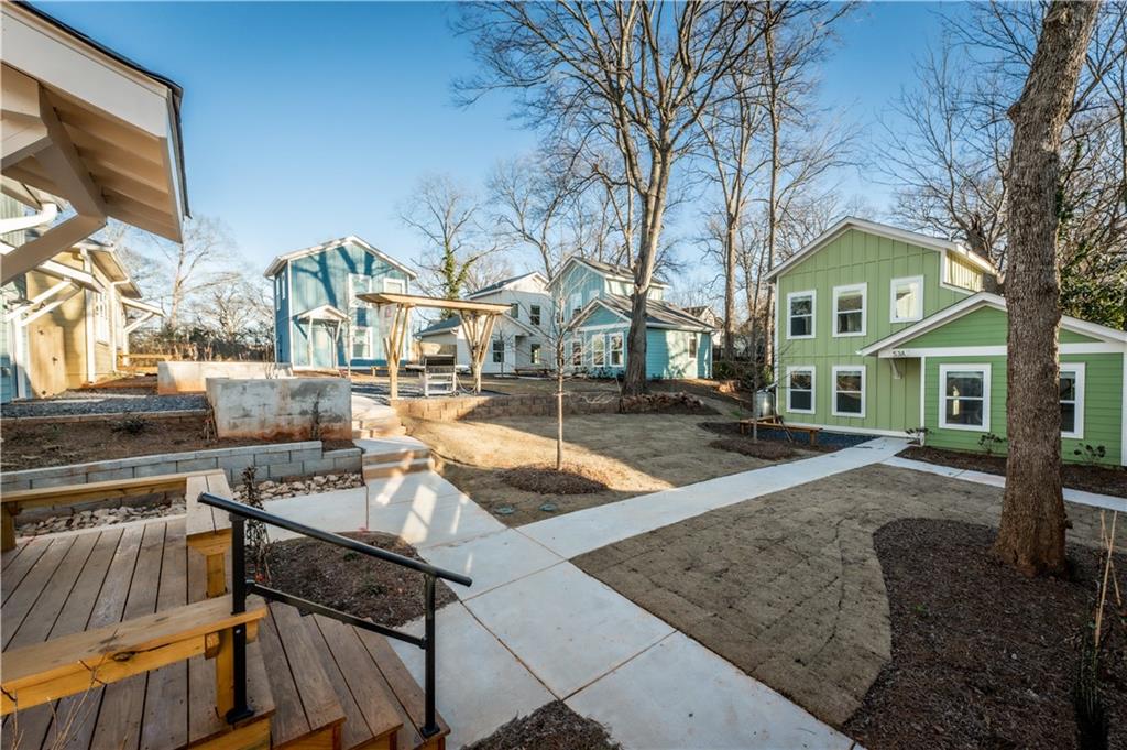 1359 Finley Street Northeast, Unit C Atlanta, GA 30307 - Photo 15 of 19 a front view of a house with entertaining space