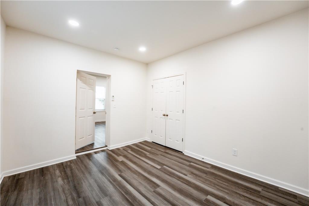 1359 Finley Street Northeast, Unit C Atlanta, GA 30307 - Photo 8 of 19 a view of empty room with wooden floor
