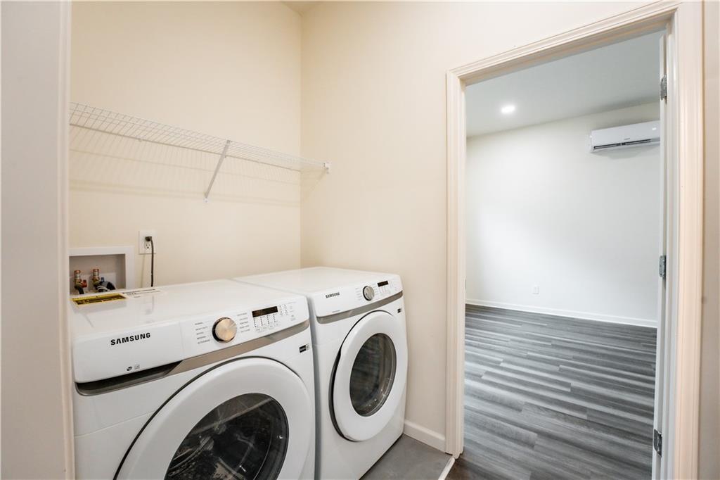 1359 Finley Street Northeast, Unit C Atlanta, GA 30307 - Photo 9 of 19 a view of storage and utility room with washer and dryer