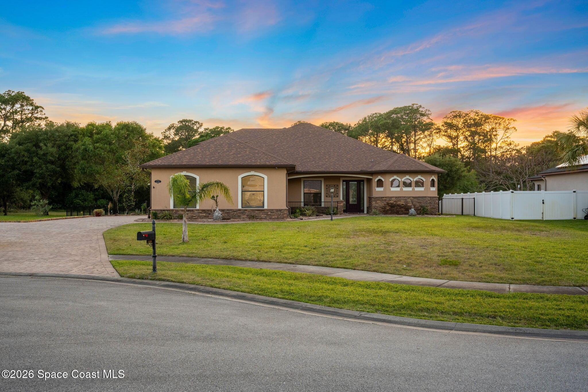 4148 Anlow Road Melbourne, FL 32904 - Photo 4 of 67 a front view of a house with a yard