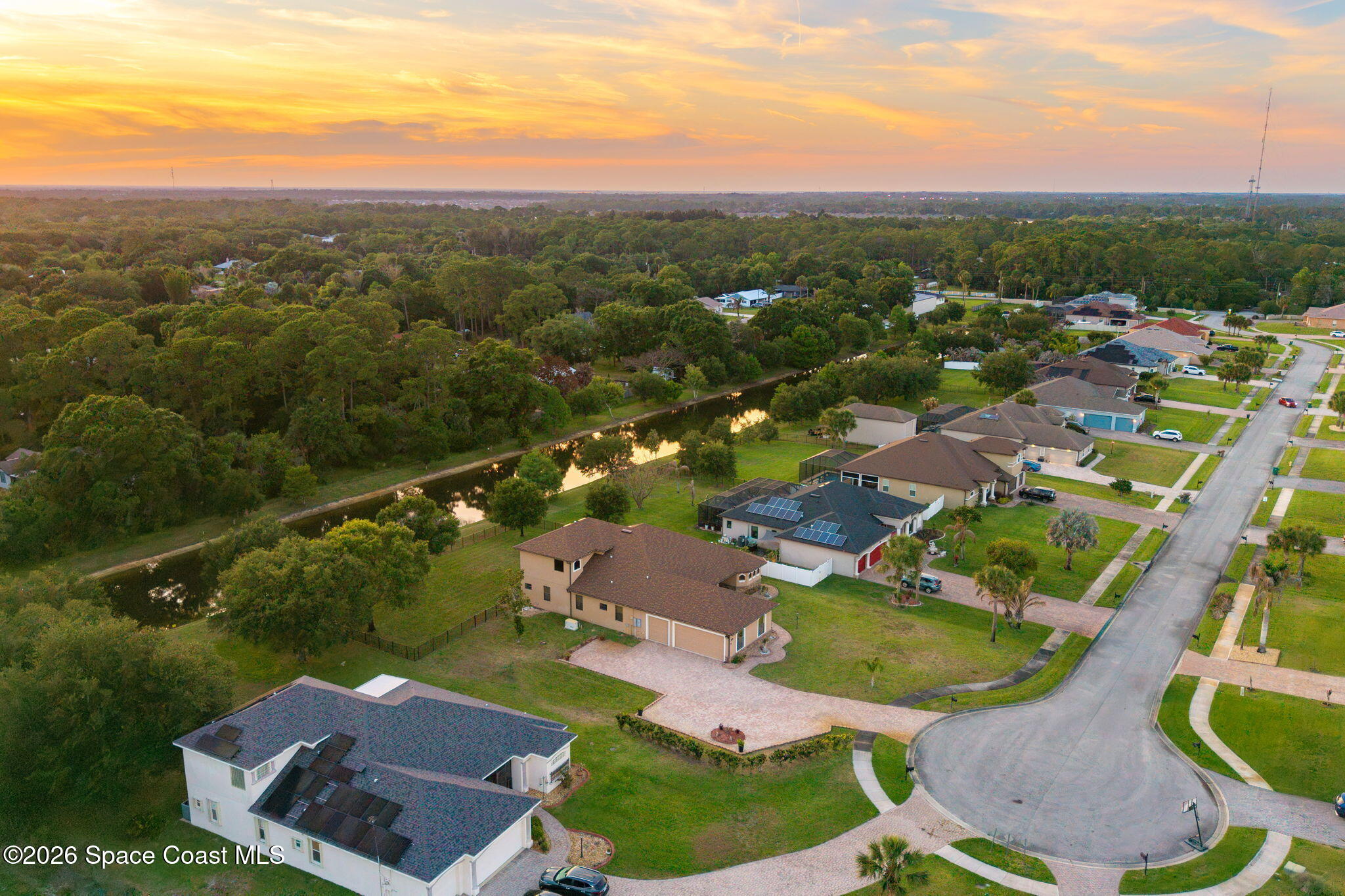 4148 Anlow Road Melbourne, FL 32904 - Photo 57 of 67 an aerial view of residential houses with outdoor space and street view