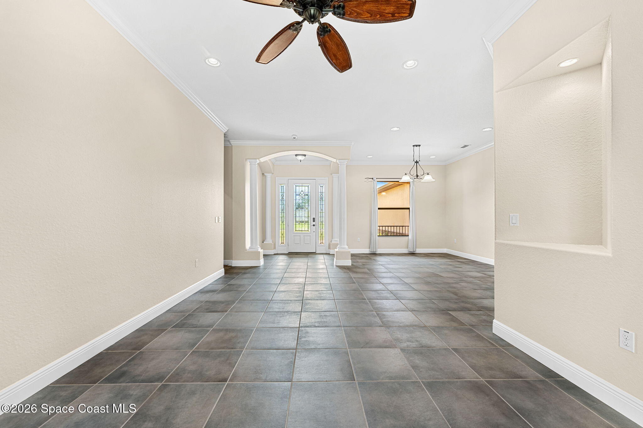 4148 Anlow Road Melbourne, FL 32904 - Photo 10 of 67 a view of an empty room with a window
