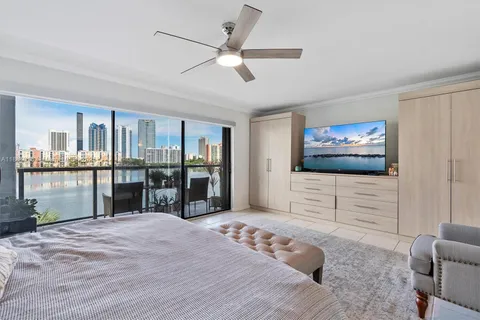 a bedroom with furniture and window